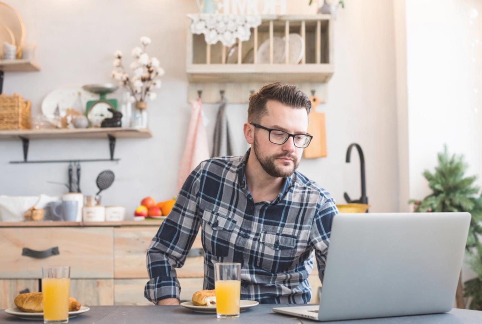 Team member reviewing client inquiries at workspace